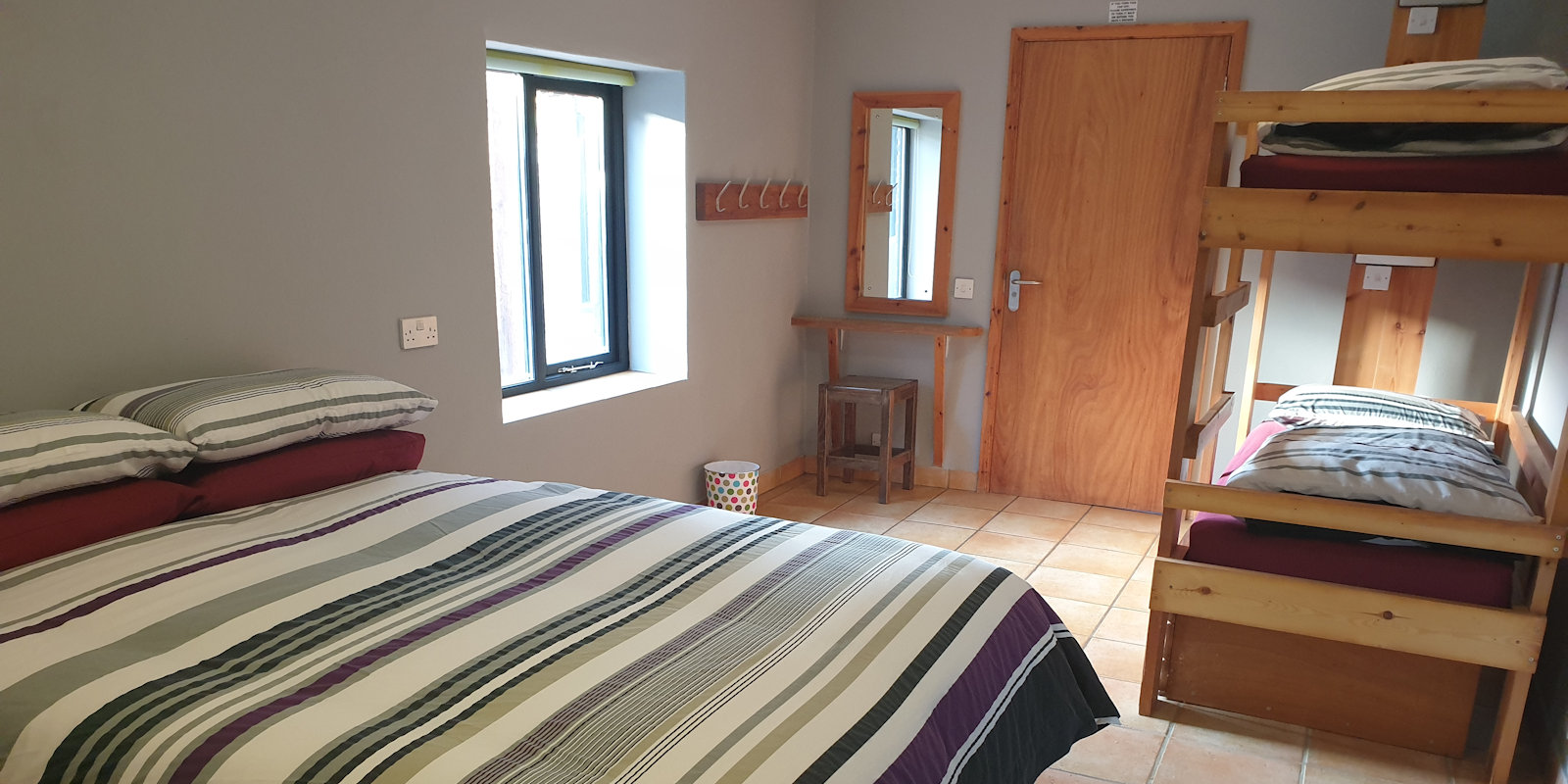 Deepdale Private Rooms, lovely ensuite & shared facility rooms with self-catering facilities.  Double, twin, triple, quad, family & small group rooms.  The perfect base to enjoy the big skies, countryside and coastline of the beautiful North Norfolk Coast. - Deepdale Camping & Rooms